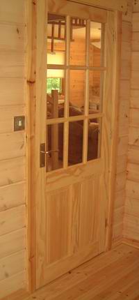 You can use glass in log cabin internal doors to increase natural light You can use glass in log cabin internal doors to increase natural light