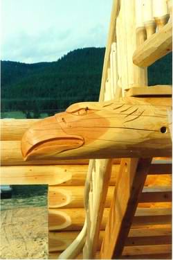 North American log cabin designs can feature hand carvings North American log cabin designs can feature hand carvings