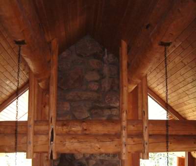 Timber and stone are often used for log cabin interior finishes in North America