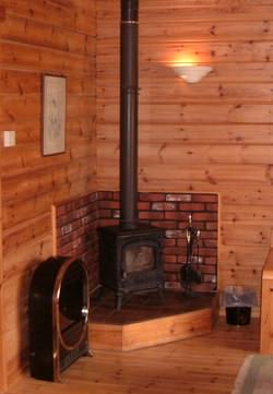 Which materials help keep your log cabin interior costs down?