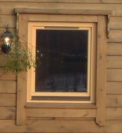 Building log cabins - window trim Building log cabins - window trim