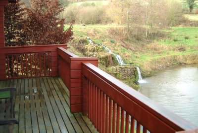A deck can really enhance a log holiday chalet A deck can really enhance a log holiday chalet