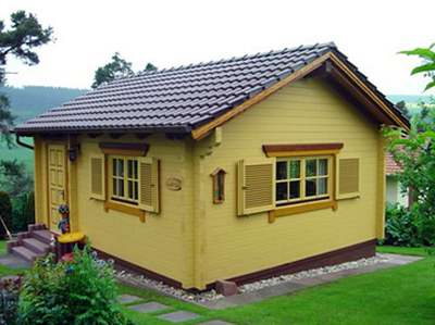 A small log cabin in the garden