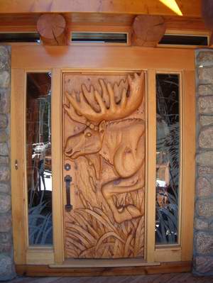 A beautiful hand carved external timber door A beautiful hand carved external timber door