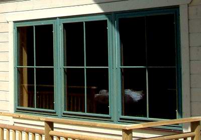 Windows in a UK log cabin