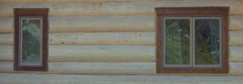 Windows in a hand scribed North American log cabin Windows in a hand scribed North American log cabin