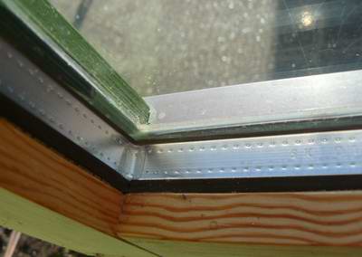 Close up showing a timber double glazed window