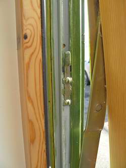 This child safety release button is located half way up the window frame This child safety release button is located half way up the window frame